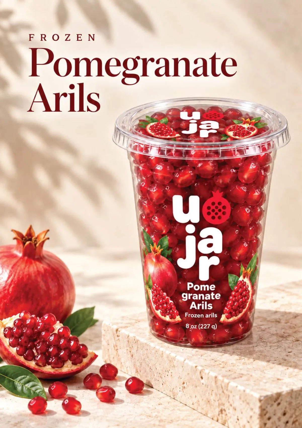 Ujar frozen pomegranate arils in an 8 oz cup